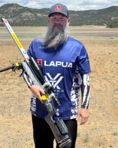 Wade Ramsey competing in the F‑T/R division at the 2026 Vihtavuori V2 Finale, aiming from a prone long‑range shooting position in challenging wind conditions.