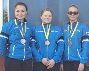 In the photo, Henna Viljanen, Olga Lähteenmäki and Aina Kivi stand together at the 300m Lapua European Cup in Eskilstuna, Sweden, captured by Tapio Kajan.